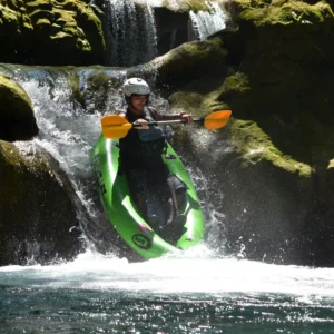 Person in the Packraft on the Waterfall, Mreznica River Canyon